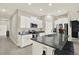 Bright kitchen with stainless steel appliances, granite countertops, and tiled floors at 12838 Wildflower Meadow Dr, Riverview, FL 33579