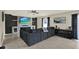 Cozy living room with tiled floor and a decorative fireplace with a mounted TV at 12838 Wildflower Meadow Dr, Riverview, FL 33579