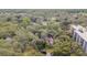 The property is surrounded by lush greenery and mature trees, offering privacy at 13702 Sweetwater Cove Pl # 25, Tampa, FL 33613
