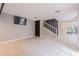 Bright living room with neutral paint, tile flooring and access to outside at 13702 Sweetwater Cove Pl # 25, Tampa, FL 33613