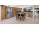 Spacious kitchen with stainless steel appliances and a center island with seating at 13851 Lake Point Dr, Clearwater, FL 33762