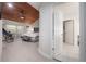 Main bedroom with wood ceiling and access to the outdoor patio at 13851 Lake Point Dr, Clearwater, FL 33762
