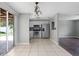 Bright dining area with open layout to kitchen with stainless appliances, perfect for entertaining at 1806 11Th Sw St, Largo, FL 33778