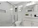 Elegant bathroom featuring modern fixtures, a glass-enclosed shower, and stylish vanity at 19003 Cedar Ln, Lutz, FL 33548