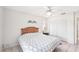 Cozy bedroom features a ceiling fan, closet, and a comfortable queen-sized bed at 1901 E Del Webb Blvd, Sun City Center, FL 33573