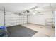 Spacious garage with ample storage space and a large garage door at 1901 E Del Webb Blvd, Sun City Center, FL 33573
