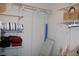 Walk-in closet featuring built-in shelving for optimal storage at 2101 Sunset Point Rd # 2304, Clearwater, FL 33765
