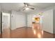 Spacious bedroom with hardwood floors and a ceiling fan, providing a cozy retreat at 2308 Long Green Ct, Valrico, FL 33596