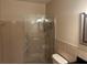 Bathroom showcasing a stand up shower with an ornate sliding door and an updated vanity at 2410 Franciscan Dr # 18, Clearwater, FL 33763