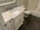 Bathroom featuring a marble vanity top, tiled backsplash, and combination tub and shower at 2410 Franciscan Dr # 18, Clearwater, FL 33763