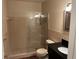 Bathroom showcasing a stand up shower with an ornate sliding door and an updated vanity at 2410 Franciscan Dr # 18, Clearwater, FL 33763