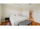 Well-lit bedroom with plush carpet and en-suite bathroom access at 2427 Nottingham Greens Dr, Sun City Center, FL 33573