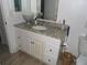 Bathroom featuring granite countertop and under sink cabinets at 2617 Cove Cay Dr # 707, Clearwater, FL 33760