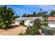 Well-maintained home featuring lush landscaping and a serene outdoor setting, providing a peaceful atmosphere at 2807 Miriam S St, Gulfport, FL 33711