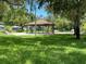 Picturesque park gazebo with lush greenery and mature trees offering scenic views at 2807 Miriam S St, Gulfport, FL 33711
