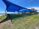 Shaded playground area with swings and play equipment at 2807 Miriam S St, Gulfport, FL 33711