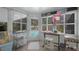 Enclosed porch with lots of natural light, an outdoor view, and direct access to the pool area at 2807 Miriam S St, Gulfport, FL 33711