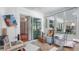 Bright, enclosed porch featuring a sliding door and several large windows offering natural light at 2807 Miriam S St, Gulfport, FL 33711