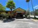 Exterior of Pia's Trattoria, a quaint restaurant with outdoor seating and lush greenery at 2807 Miriam S St, Gulfport, FL 33711