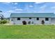 Charming single-story home with well-maintained lawn and blue tiled roof at 302 Andover Pl # G156, Sun City Center, FL 33573