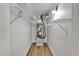 Utility closet with a modern HVAC system, shelving, and white walls at 302 Andover Pl # G156, Sun City Center, FL 33573