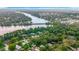 Breathtaking aerial view of the Hillsborough River meandering through lush greenery and neighborhoods at 307 Fern Cliff Ave, Temple Terrace, FL 33617