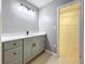 Modern bathroom with sleek vanity, quartz countertop, and neutral paint at 307 Fern Cliff Ave, Temple Terrace, FL 33617