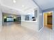 Open kitchen space with large island and plenty of room for entertaining at 307 Fern Cliff Ave, Temple Terrace, FL 33617