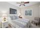 Inviting bedroom with large window and coastal-themed decor at 316 Cedar Ln, Largo, FL 33770