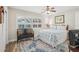 Cozy bedroom featuring a large window with bright natural light at 316 Cedar Ln, Largo, FL 33770