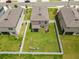 A bird's eye view shows the fenced backyard and outdoor seating area, creating an inviting space at 36412 Garden Wall Way, Zephyrhills, FL 33541