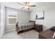 Comfortable bedroom with neutral tones, natural light and closet at 36412 Garden Wall Way, Zephyrhills, FL 33541
