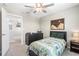Comfortable bedroom showcasing a ceiling fan and a dresser with decor at 36412 Garden Wall Way, Zephyrhills, FL 33541