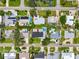 Aerial view of a residential area showcasing the property's position among well-manicured lawns at 3944 49Th S Ave, St Petersburg, FL 33711