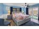 Serene bedroom with a plush bed, soft lighting, and a private patio entrance at 3944 49Th S Ave, St Petersburg, FL 33711
