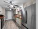 Spacious kitchen with custom cabinets, butcher block countertops, stainless steel appliances at 3944 49Th S Ave, St Petersburg, FL 33711