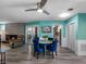 Comfortable living room with a fireplace, stylish furniture, and light, bright walls at 3944 49Th S Ave, St Petersburg, FL 33711