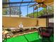 Enclosed patio featuring a charming water feature and comfortable seating area at 3944 49Th S Ave, St Petersburg, FL 33711