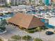 Aerial photo of an outdoor tiki bar with thatched roof on the waterfront at 3944 49Th S Ave, St Petersburg, FL 33711