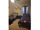 Bedroom with two twin beds, neutral walls, and space to relax at 4436 Horseshoe Pick Ln, Valrico, FL 33594