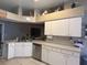 Bright kitchen features an open layout and modern appliances at 4436 Horseshoe Pick Ln, Valrico, FL 33594