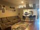 Cozy living room open to the kitchen and breakfast bar at 4436 Horseshoe Pick Ln, Valrico, FL 33594