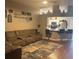 Cozy living area open to the kitchen and breakfast bar at 4436 Horseshoe Pick Ln, Valrico, FL 33594