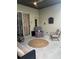 Covered patio offers an outdoor seating area and a comfortable space for relaxation at 4436 Horseshoe Pick Ln, Valrico, FL 33594
