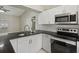 Updated kitchen with modern appliances, sleek countertops and ample cabinet space at 4607 N Country Hills Ct, Plant City, FL 33566