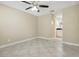 Bright main bedroom with tile flooring and ensuite bathroom at 4607 N Country Hills Ct, Plant City, FL 33566