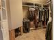 Spacious walk-in closet with ample storage, shelving, and clothing racks for organization at 487 Harbor S Dr, Indian Rocks Beach, FL 33785