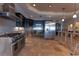 Home's under-construction kitchen featuring stainless steel appliances and tile flooring at 487 Harbor S Dr, Indian Rocks Beach, FL 33785