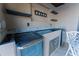 Outdoor kitchen featuring stainless steel appliances and countertop space for entertaining at 487 Harbor S Dr, Indian Rocks Beach, FL 33785