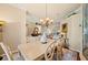 Dining table with seating for six, decorative china and bright open floor-plan with multiple spaces at 511 Duque Rd, Lutz, FL 33549